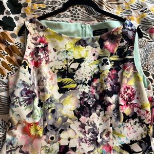 Floral Tahari boat neck sleeveless dress.
